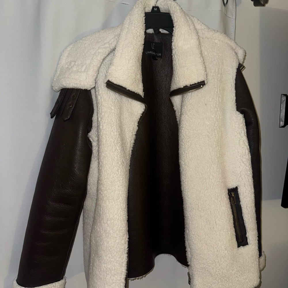 Universal Standard Leather Jacket in Dark Brown and Cream